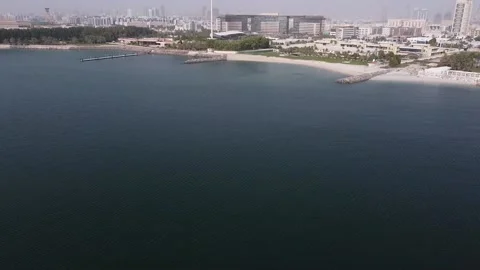 Drone shot of UAE flag waving in the sky. UAE Flag day. UAE National day. Stock Footage 135406062