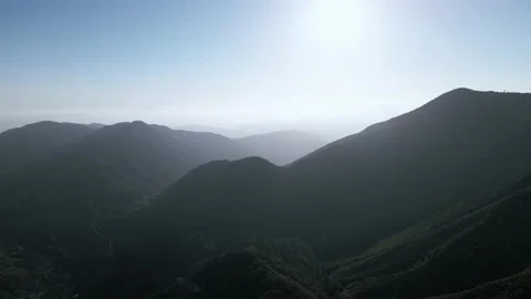 Drone shot of valley under Mount Baldy, San Gabriel Mountains, California, USA Video stock 164627352