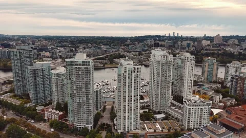 Drone Shot of Vancouver's Skyline Featuring a Twisting High-Rise Tower Stock-Footage 345983869