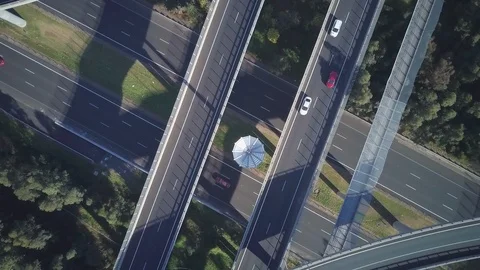 Drone shot of vehicles moving on bridge during sunny day Stock Footage 122474983
