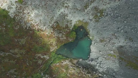 Drone shot vertically down of the lake in the form of a heart Stock Footage 227126610