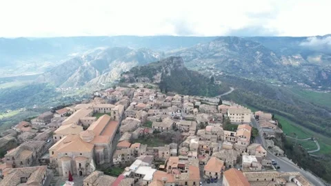 Drone shot view of mountain and house Video stock 268897776