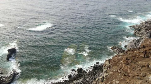 Drone shot of volcanic cliff coast and sea on El Hierro island Stock Footage 193672959