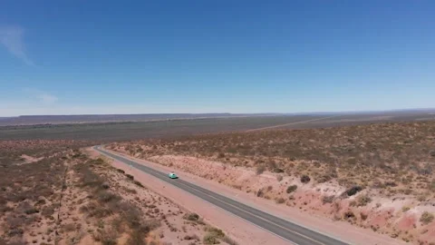 Drone shot of a vw bus (van) in Patagonia desert Stock Footage