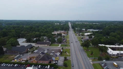 A drone shot of Wade Hampton leading towards downtown Greenville South Stock Footage 249493997