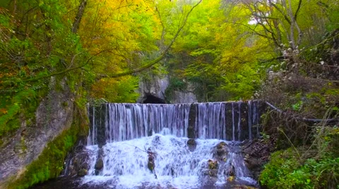 Drone shot Waterfall in a forest Stock Footage 64111604