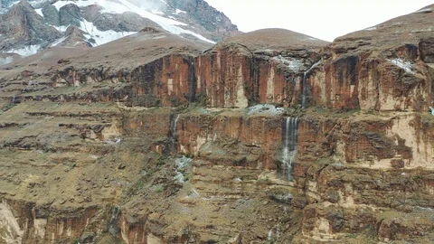 Drone shot of waterfall in the mountain Видео 121950124