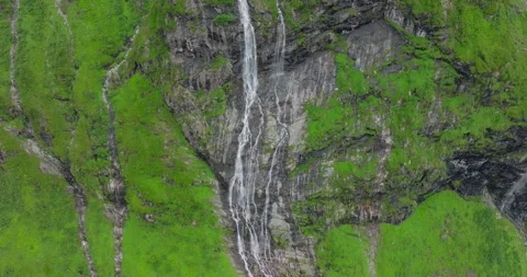 Drone shot of a waterfall in the mountains during Summer-3 Stock Footage 283568738