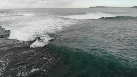 Drone shot of waves crashing Stock Footage 135577459