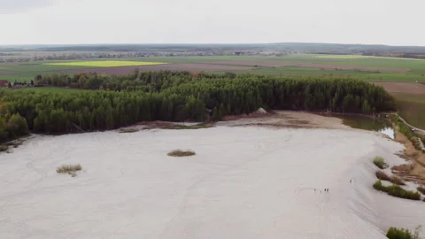 Drone shot of a white desert by the forest. Stock Footage 149112965