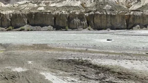 Drone Shot of Wide Riverbed and Spiti River in Himalayan Valley Stock Footage 329325602