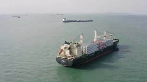Drone shot of windmill blades on bulk carrier, Singapore 스톡 동영상 157572412