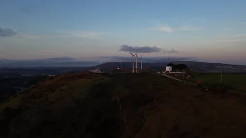 Drone Shot of Windmill at Colorful Sunset Landscape Stock Footage 333202164