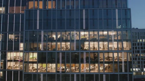Drone shot at the windows of a night skyscraper. Stock Footage 170839856