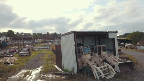 Drone shot of a wrecking yard Stock Footage 93926610