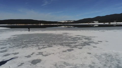 Drone shotover on ice lake mountain Stock Footage