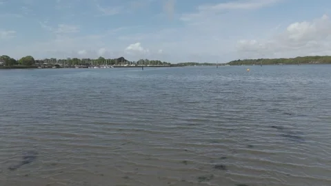 Drone Shots of Beach and Harbour, Low to High - 4K 25fps Stock Footage 308917128