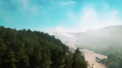 Drone shots of an fire due to an explosion in a garbage recycling station Stock Footage 156227032