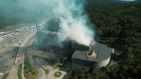 Drone shots of an fire due to an explosion in a garbage recycling station Stock Footage 156227085
