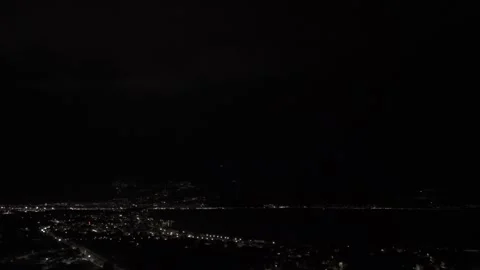Drone shots of lightning strikes lighting up a mountain Stock Footage 288740754