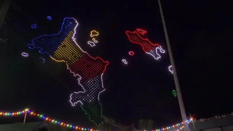 Drone show of Seychelles Flag Colours Drone Map Show 50th Independence Stock Footage 339194990