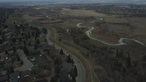 Drone show of a small road next to a creek in Canada Stock Footage 167564914