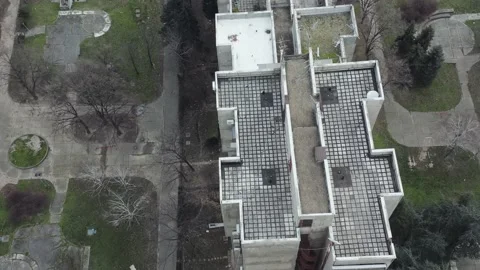 Drone Showcases a Series of Steps-like Brutalist Residential Buildings Video stock 148473843