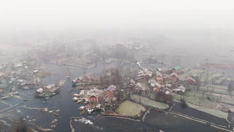 Drone showcasing the stillness and charm of Dal Lake’s frozen interiors kissed Stock Footage 311020701