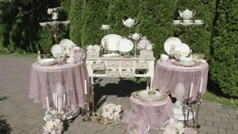 Drone side tracking along tableware display Stock Footage 329540358