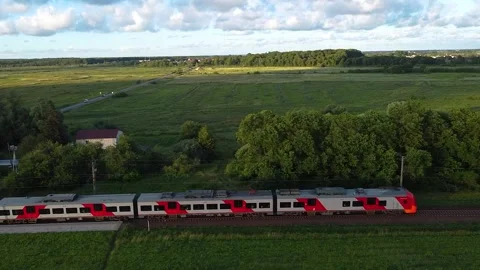 Drone side view of a train departing from the station Video stock 201066371