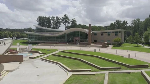 Drone side ways fly over amphitheater toward city hall. Stock Footage 171134634