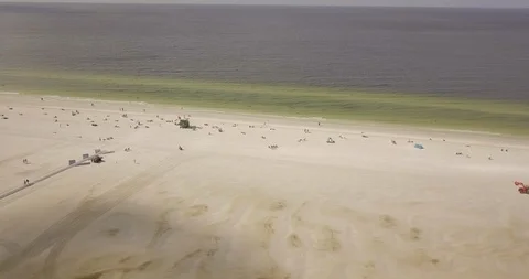 Drone of Siesta Key beach moving towards ocean horizon Stock Footage 94836834