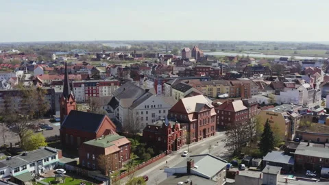 Drone sightseeing flight over Wittenberge in the Prignitz. Many houses and a Stock Footage 163122585