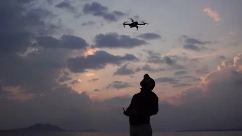 Drone silhoutte man Stock Footage 140804355