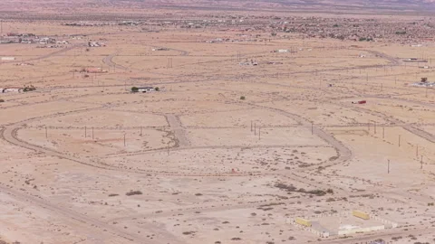 Drone Slide Along Desert Circle Avenue Showing Empty Street Grid in Salton City Stock-Footage 332680021