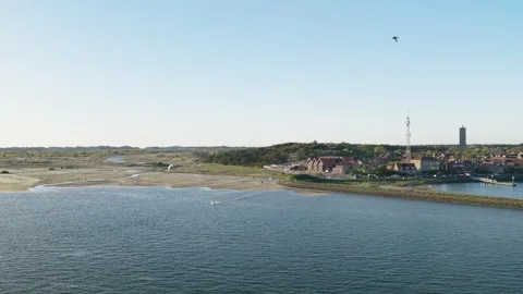 Drone slide tracking a kitesurfer near West-Terschelling, Friesland, Netherlands Stock Footage 342467689