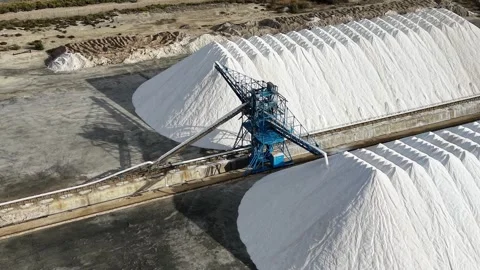 Drone Slow Approach to Salt Stacking Conveyor Machine Santa Pola Stock Footage 346790447