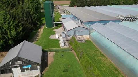 Drone - Slow Downward View of the Water Supply Station of Greenhouses Stock Footage 314227523