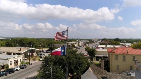 Drone Slow Motion Dolly Right Texas Flag Fredericksburg Texas Stock Footage 118397961