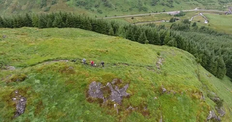 Drone Slow Spin Shot of a Walking Path on a Scottish Hill Stock-Footage 97592473