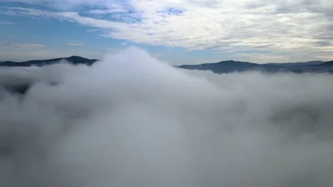 The drone slowly flies around the cloud Stock Footage 137969057