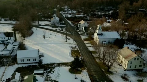 A Drone Slowly Rises Over A Small New England Riverside Town Stock Footage 329901454