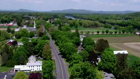 A Drone Slowly Rises Over A Small New England Riverside Town Stock Footage 329901460