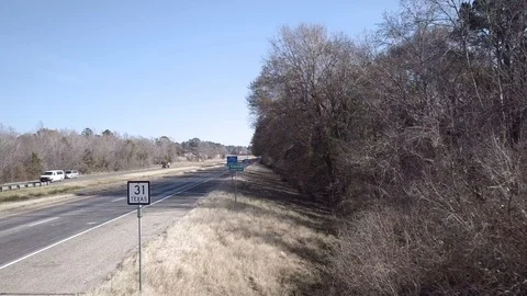 Drone Smith County Sign and Freeway Traffic Forward CU Stock Footage 99603439