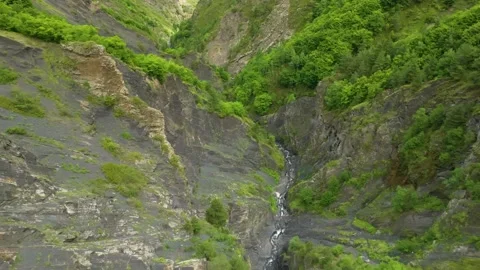 Drone soaring above the lush forested mountains of Dagestan in Eastern Caucasus, Stock Footage 303398681