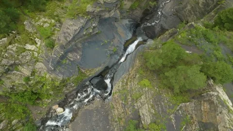 Drone soaring high above the mountain ridges of Eastern Caucasus, Russia, captur Stock Footage 303398614