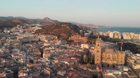Drone soaring over malaga rooftops, revealing ancient alcazaba fortress and.. Stock Footage 341828624