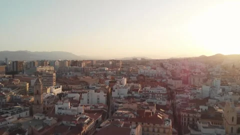 Drone soaring over Malaga's rooftops, revealing historic architecture and v.. Stock Footage 344052008