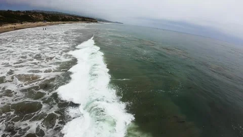Drone soars above Crystal Cove State Park Beach in California, revealing Stock Footage 280691692