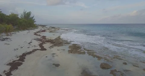 Drone Speeding Through Beach Shore Forward- 4K@24fps Video stock 100645009